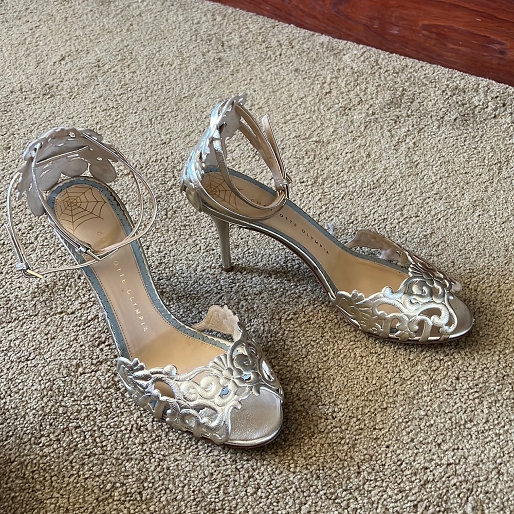 Gold Charlotte Olympia heels. Perfect for that special occasion.